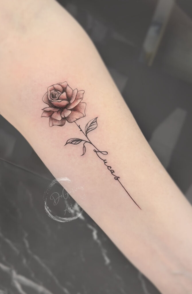 small rose tattoo with word as stemTikTok Search